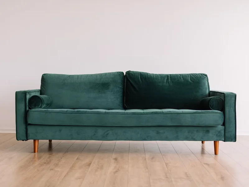 Comfortable furnished living room with clean sofa seating area
